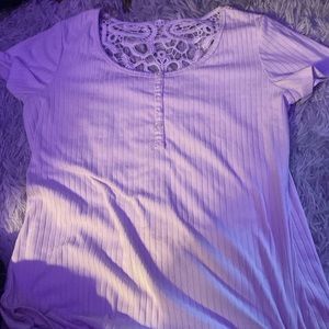 shirt with lace on the top of the back.